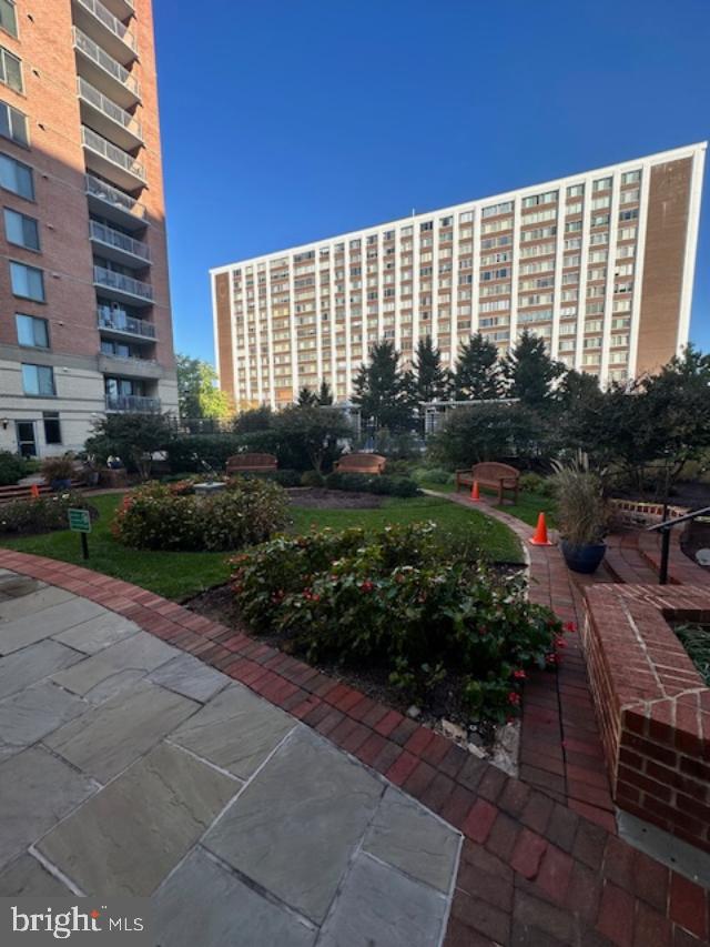 11710 Old Georgetown Road, Unit 212 North Bethesda, MD 20852 - Photo 22 of 23 a front view of a building with garden