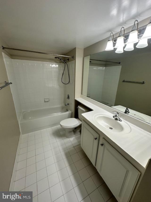11710 Old Georgetown Road, Unit 212 North Bethesda, MD 20852 - Photo 8 of 23 a bathroom with a sink a toilet and shower