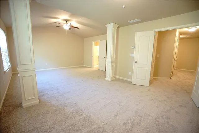 an empty room with a bathroom