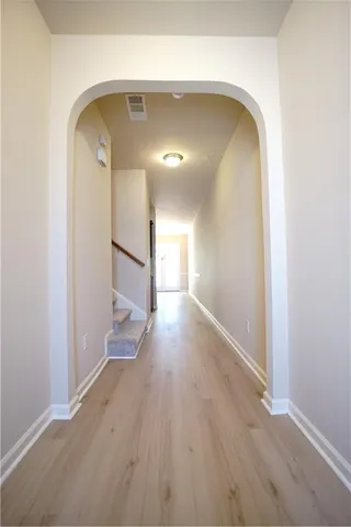 a view of entryway with wooden floor