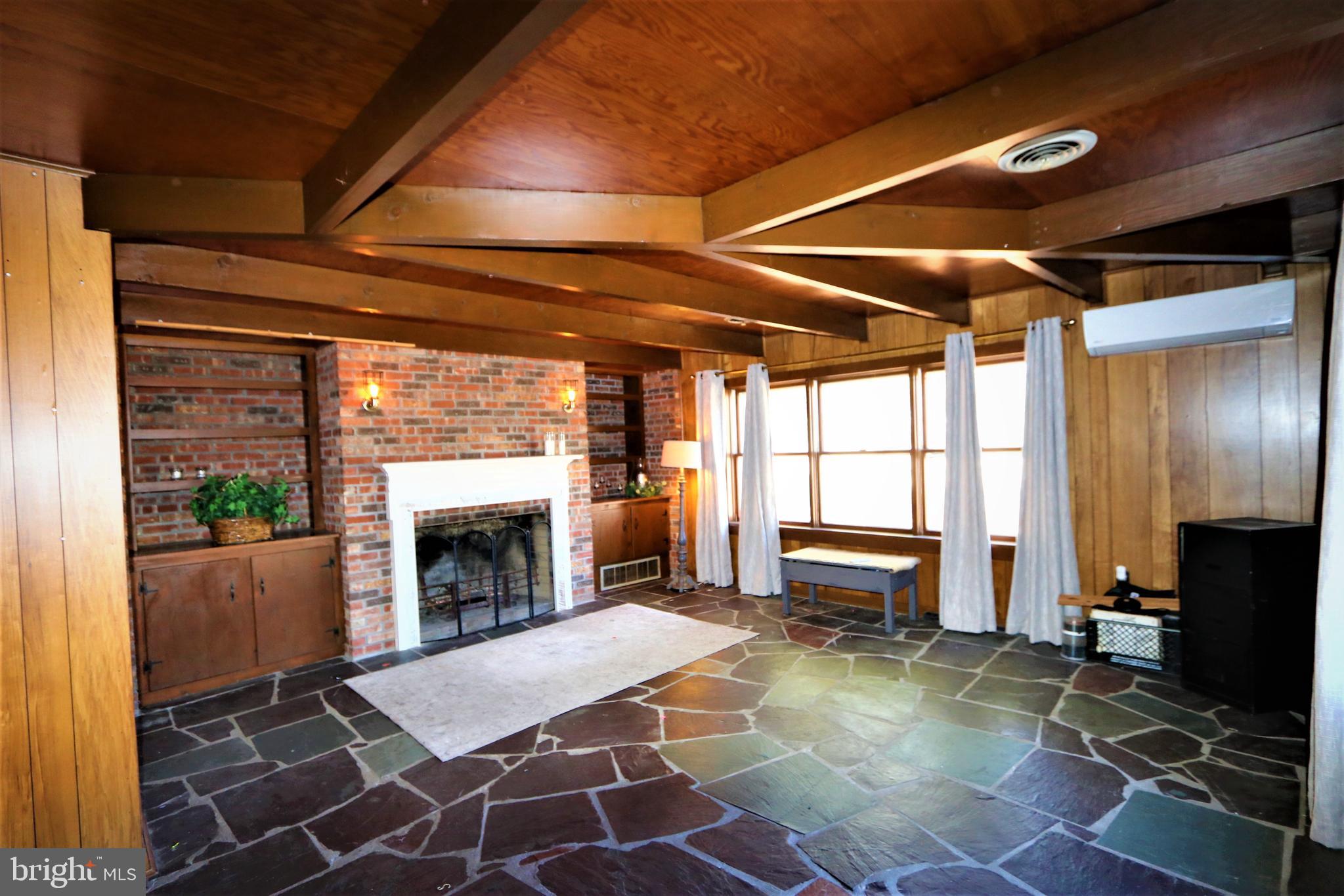 3119 Millington Road Millington, MD 21651 - Photo 19 of 44 Large family room with fireplace