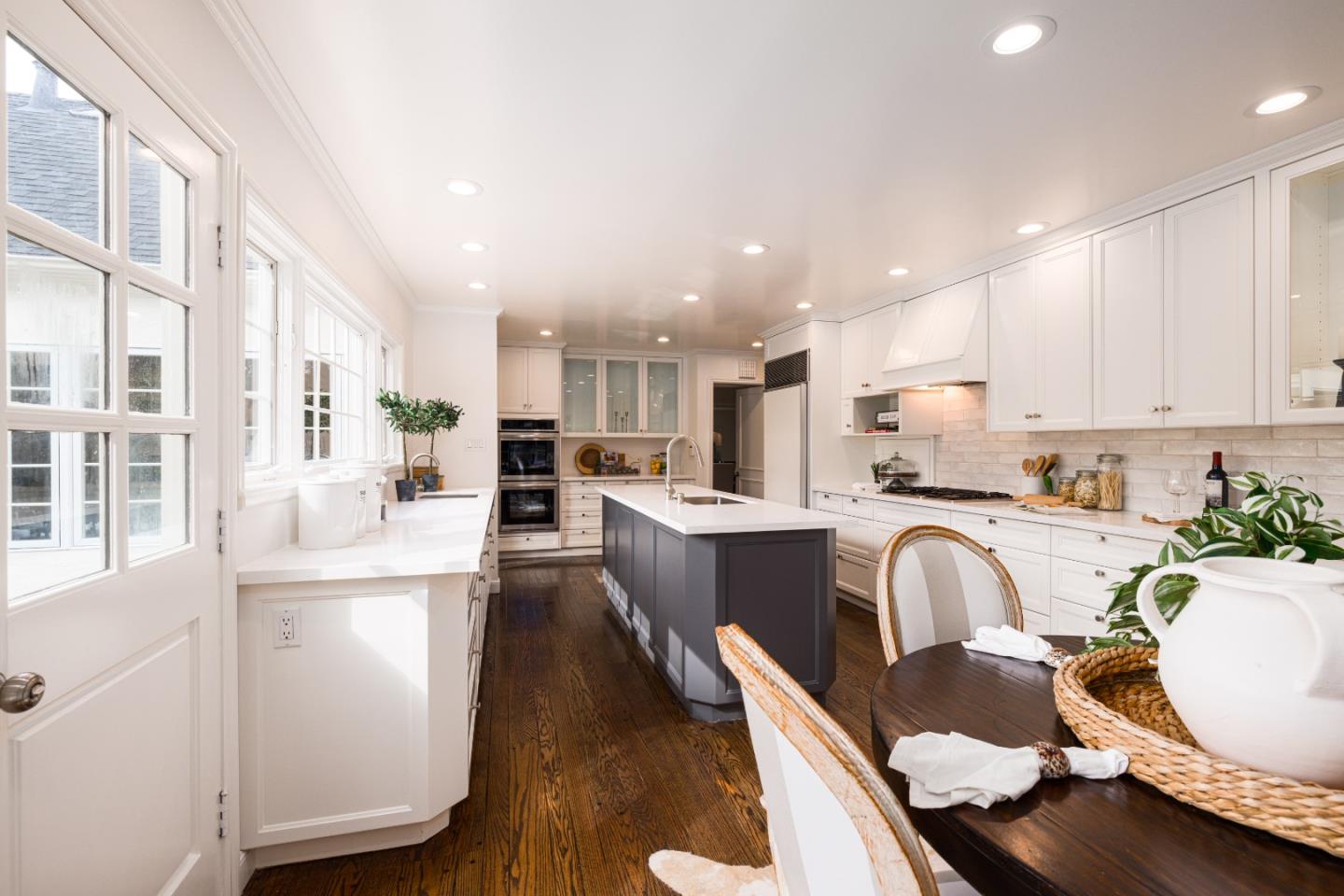 628 Alhambra Road San Mateo, CA 94402 - Photo 12 of 35 a living room with stainless steel appliances furniture a refrigerator and a kitchen view