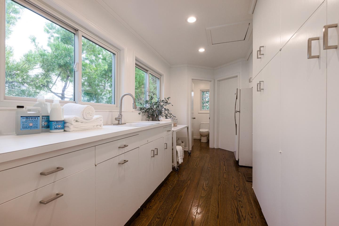 628 Alhambra Road San Mateo, CA 94402 - Photo 18 of 35 a spacious bathroom with a double vanity sink a mirror and a shower