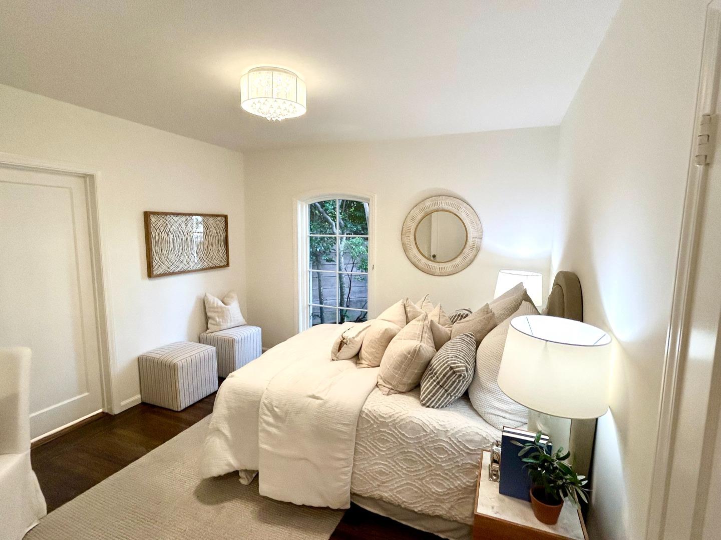 628 Alhambra Road San Mateo, CA 94402 - Photo 24 of 35 a bedroom with a bed and wooden floor