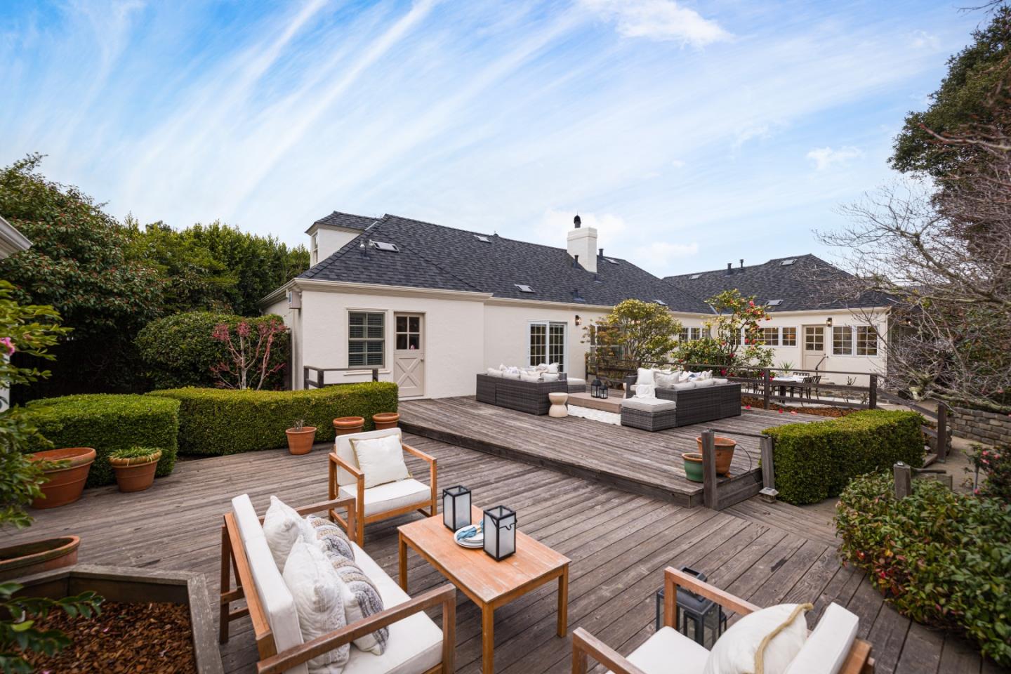 628 Alhambra Road San Mateo, CA 94402 - Photo 26 of 35 a view of a house with couches chairs and a fire pit