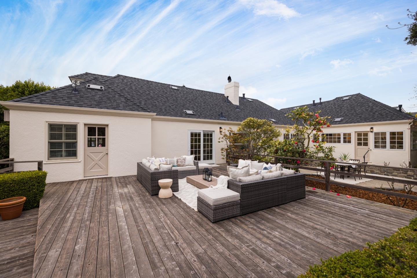 628 Alhambra Road San Mateo, CA 94402 - Photo 28 of 35 a balcony with furniture and wooden floor