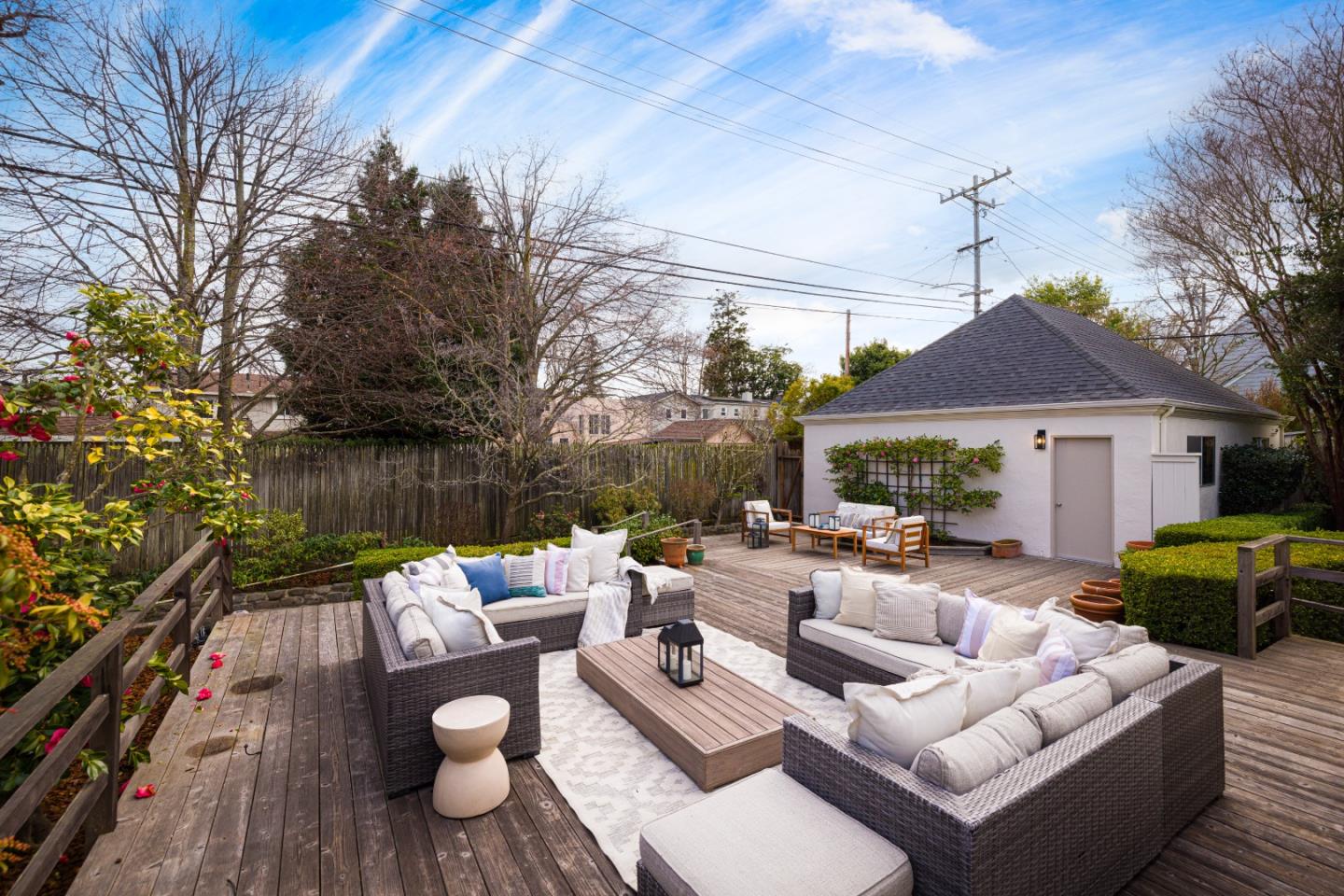 628 Alhambra Road San Mateo, CA 94402 - Photo 31 of 35 a view of a patio with couches chairs and a fire pit