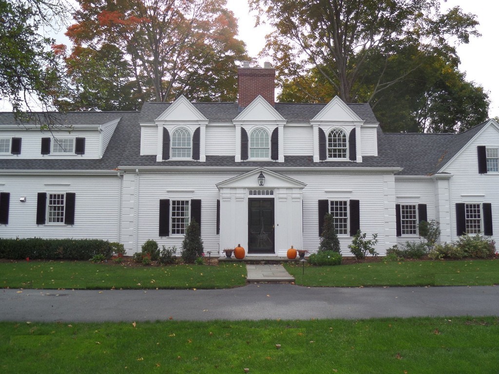 285 Musketaquid Road Concord, MA 01742 - Photo 2 of 30 a front view of a house with a garden and plants