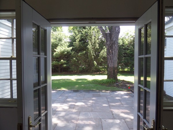 285 Musketaquid Road Concord, MA 01742 - Photo 25 of 30 a view of backyard with large trees and plants