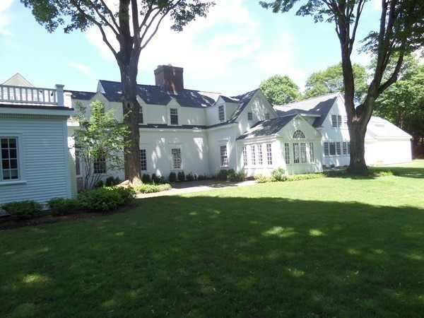 285 Musketaquid Road Concord, MA 01742 - Photo 27 of 30 a view of a house with a big yard and large trees