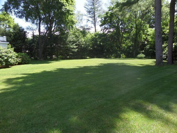 285 Musketaquid Road Concord, MA 01742 - Photo 29 of 30 a view of field with trees in the background