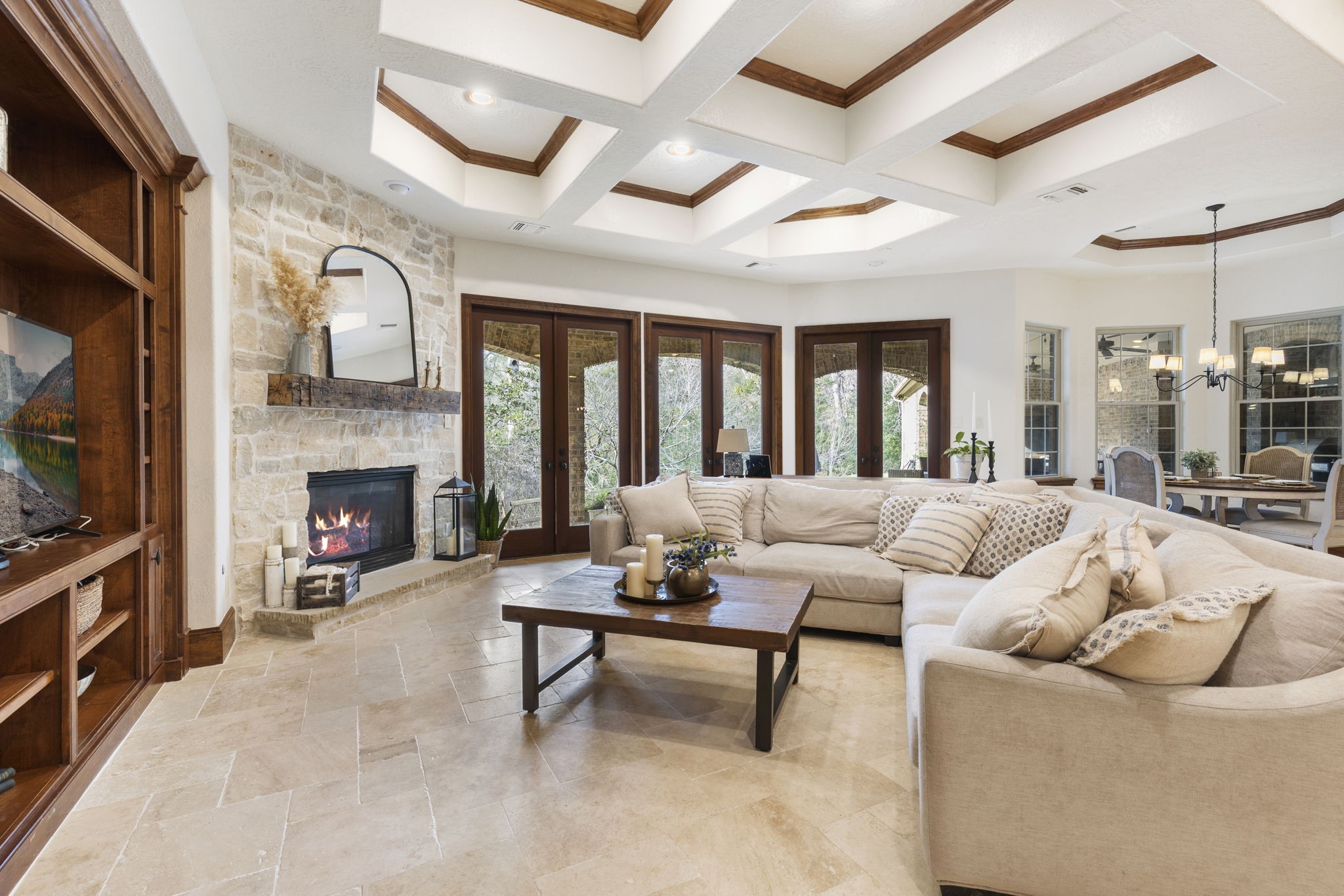 7421 Enchanted Stream Drive Conroe, TX 77304 - Photo 18 of 50 a living room with furniture and a fireplace