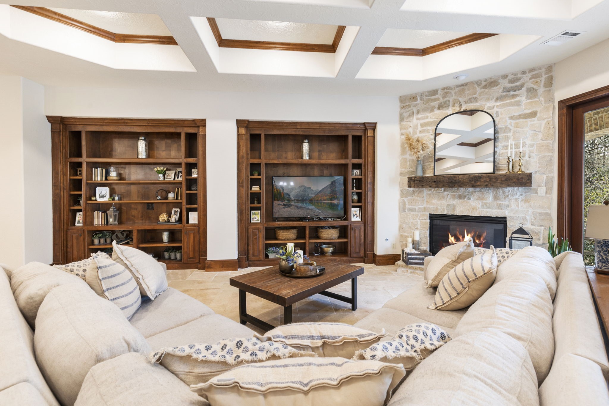 7421 Enchanted Stream Drive Conroe, TX 77304 - Photo 19 of 50 a living room with furniture ceiling fan and a fireplace