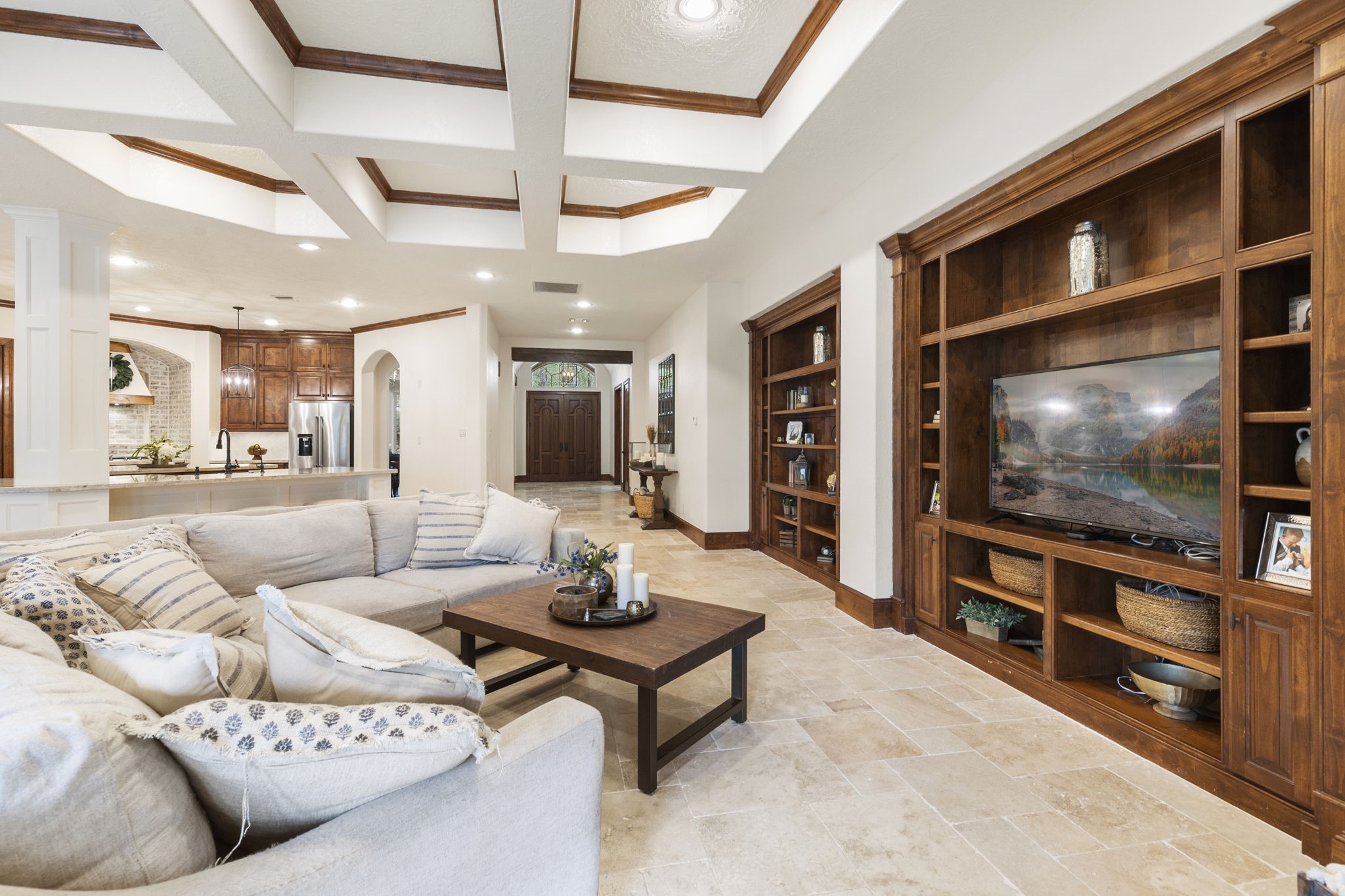 7421 Enchanted Stream Drive Conroe, TX 77304 - Photo 20 of 50 a living room with furniture and a flat screen tv