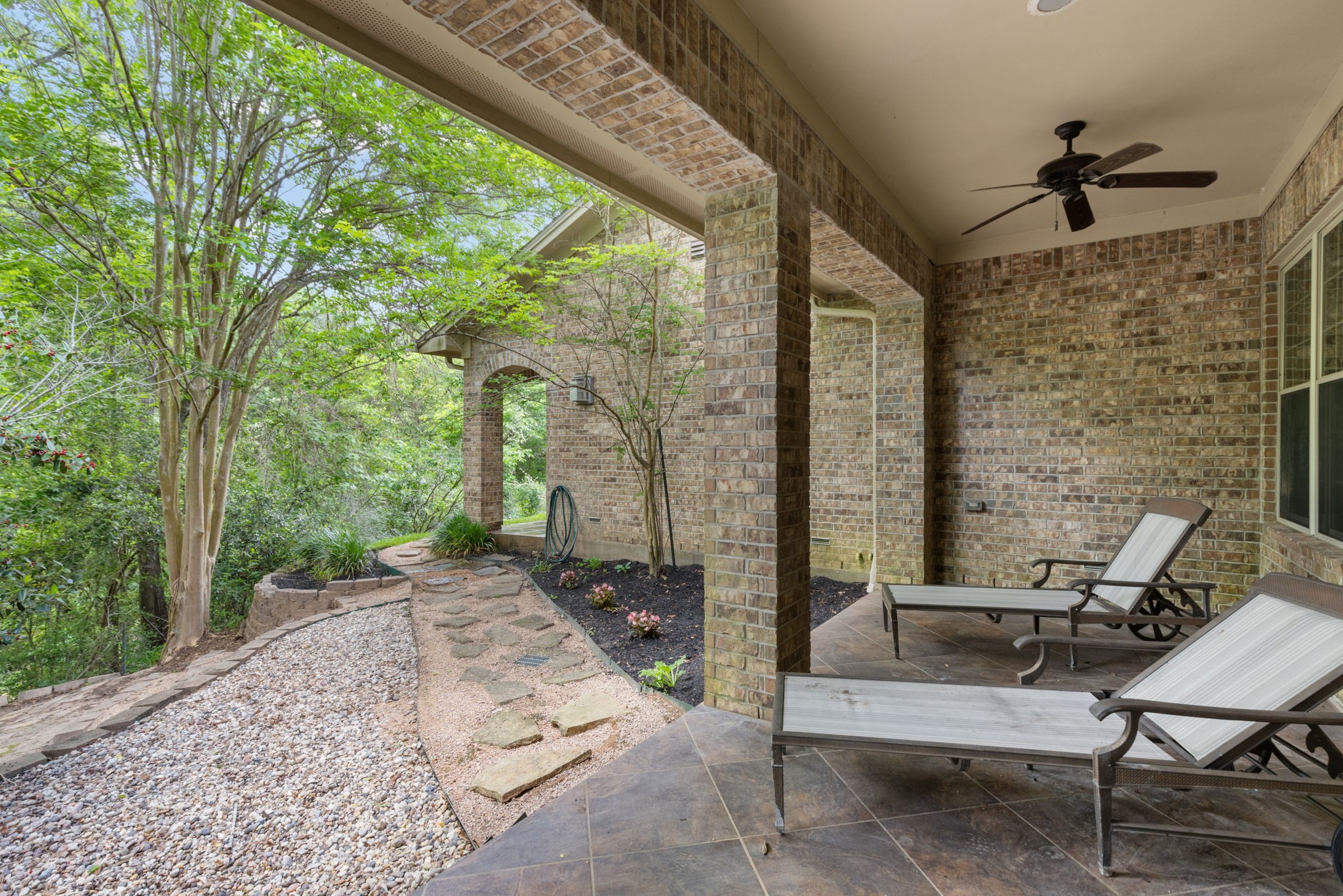7421 Enchanted Stream Drive Conroe, TX 77304 - Photo 24 of 50 a view of a couches in the patio with a backyard