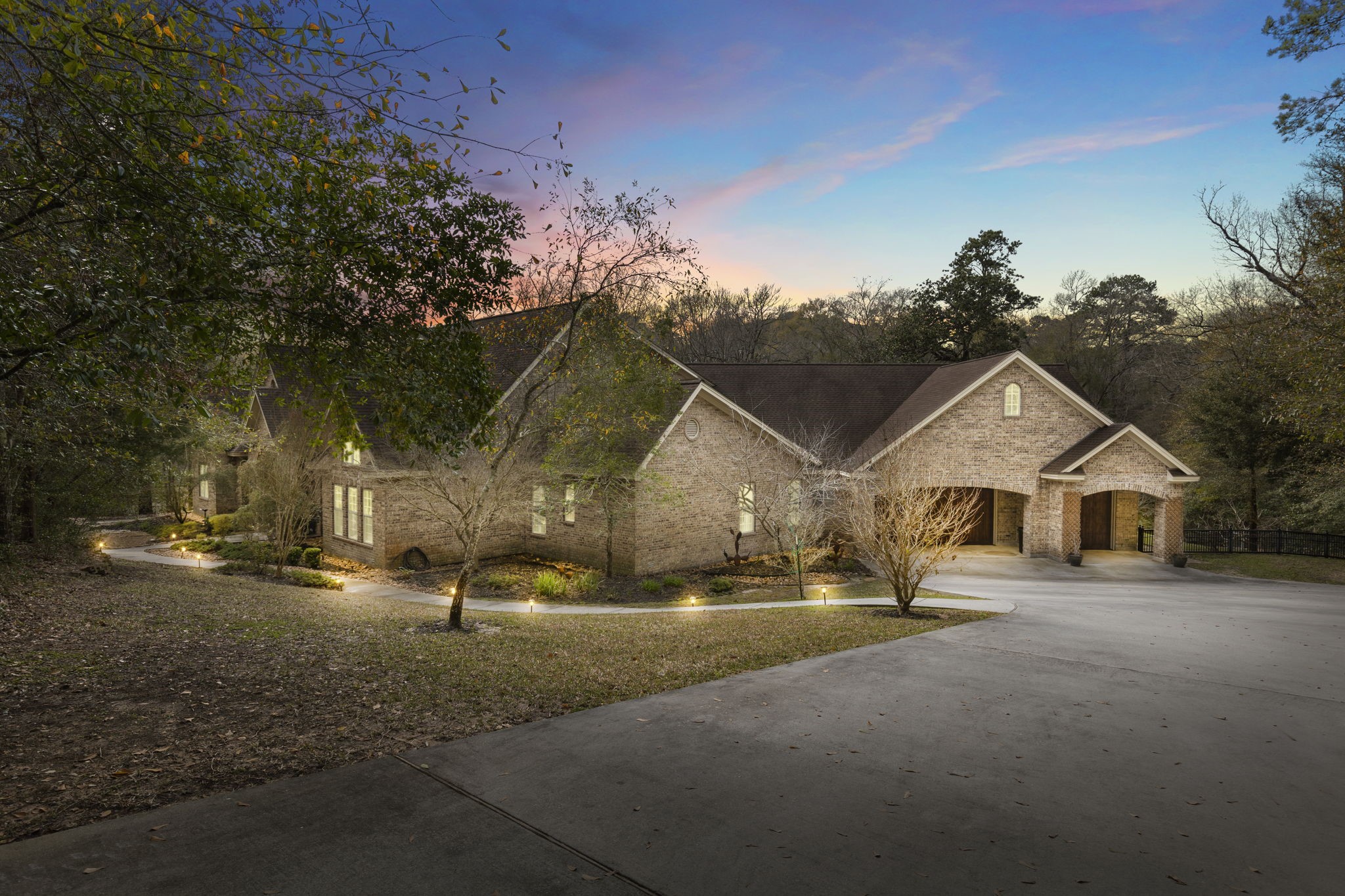 7421 Enchanted Stream Drive Conroe, TX 77304 - Photo 3 of 50 a view of a town with barn house
