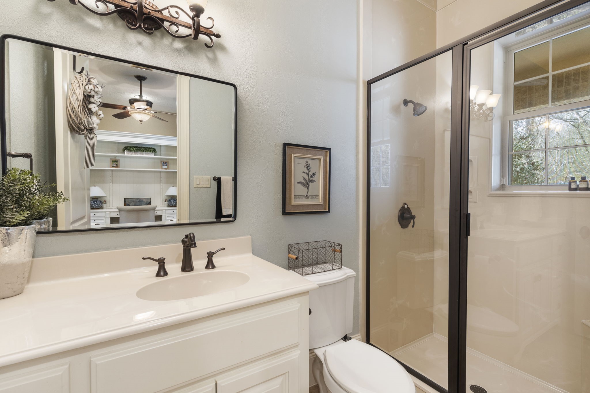 7421 Enchanted Stream Drive Conroe, TX 77304 - Photo 50 of 50 a bathroom with a sink a toilet and shower