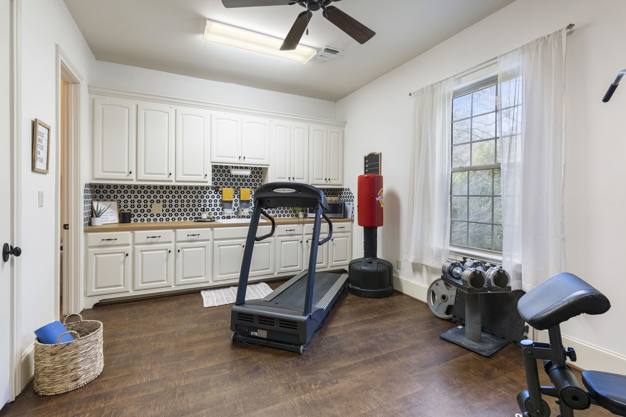 7421 Enchanted Stream Drive Conroe, TX 77304 - Photo 32 of 50 a view of a room with gym equipment