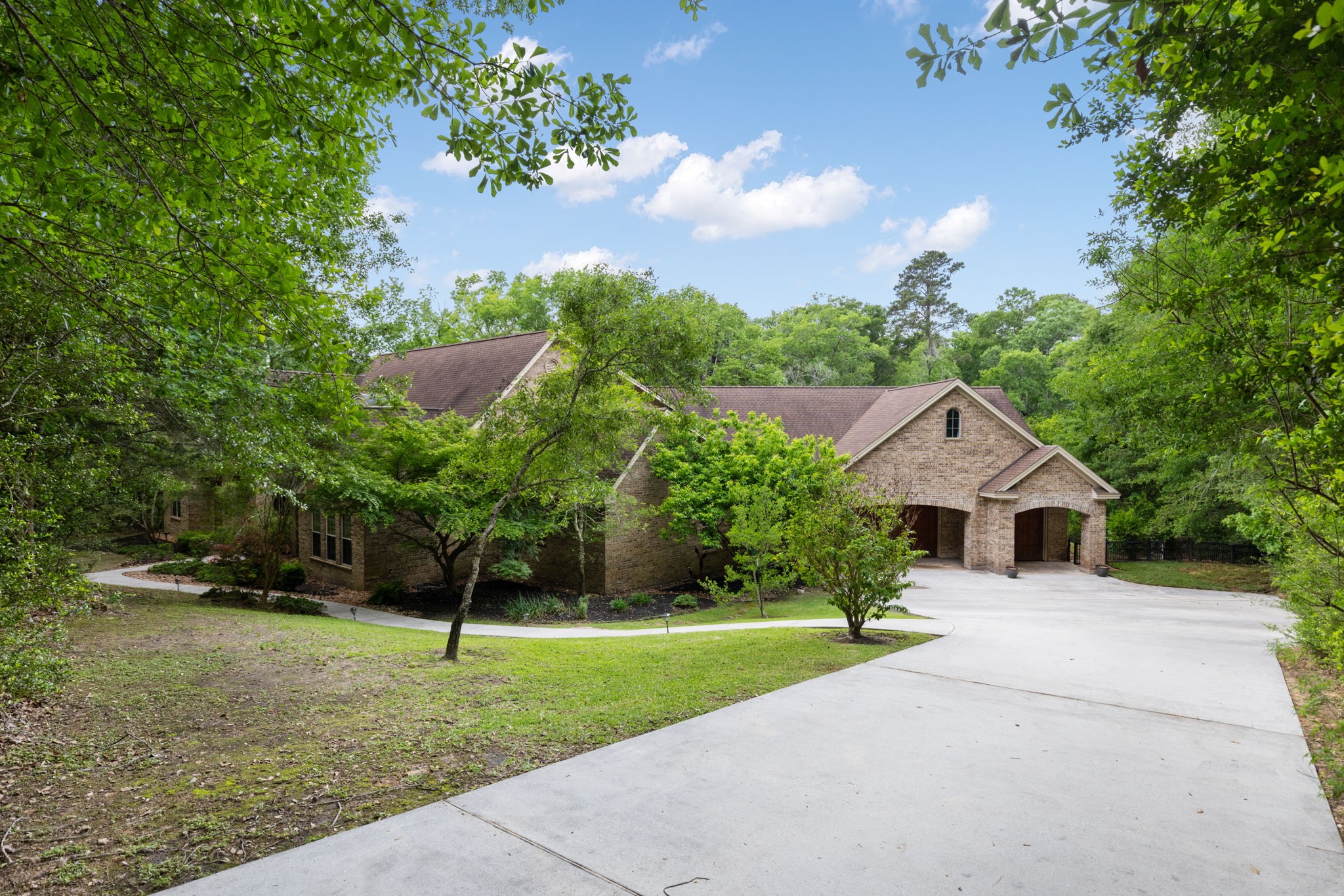 7421 Enchanted Stream Drive Conroe, TX 77304 - Photo 44 of 50 a view of house and outdoor space