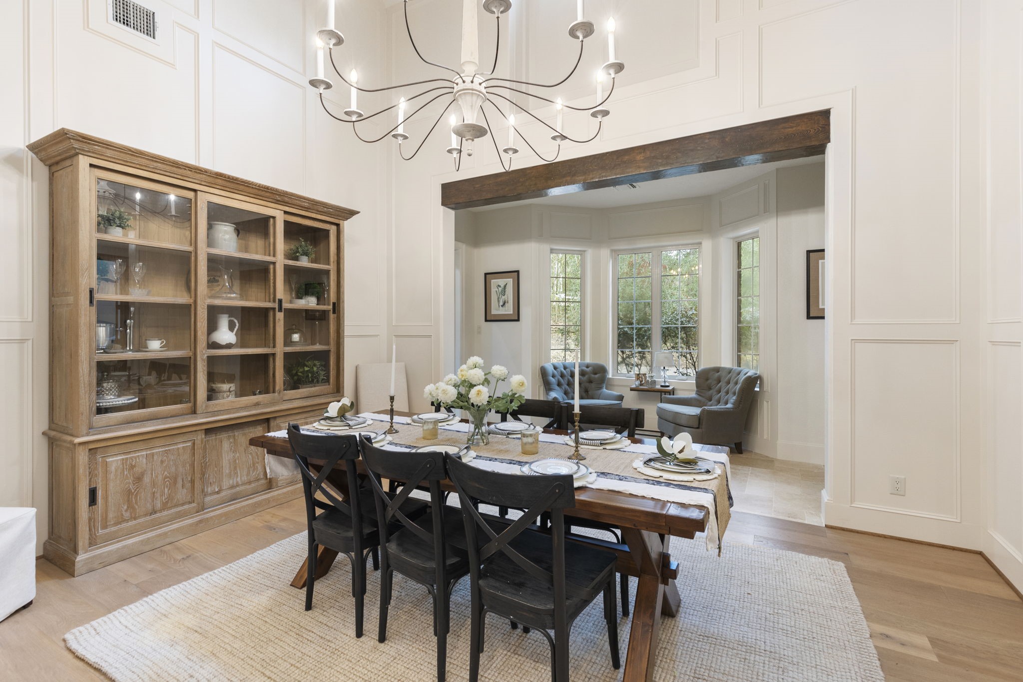 7421 Enchanted Stream Drive Conroe, TX 77304 - Photo 9 of 50 a view of a dining room with furniture and wooden floor