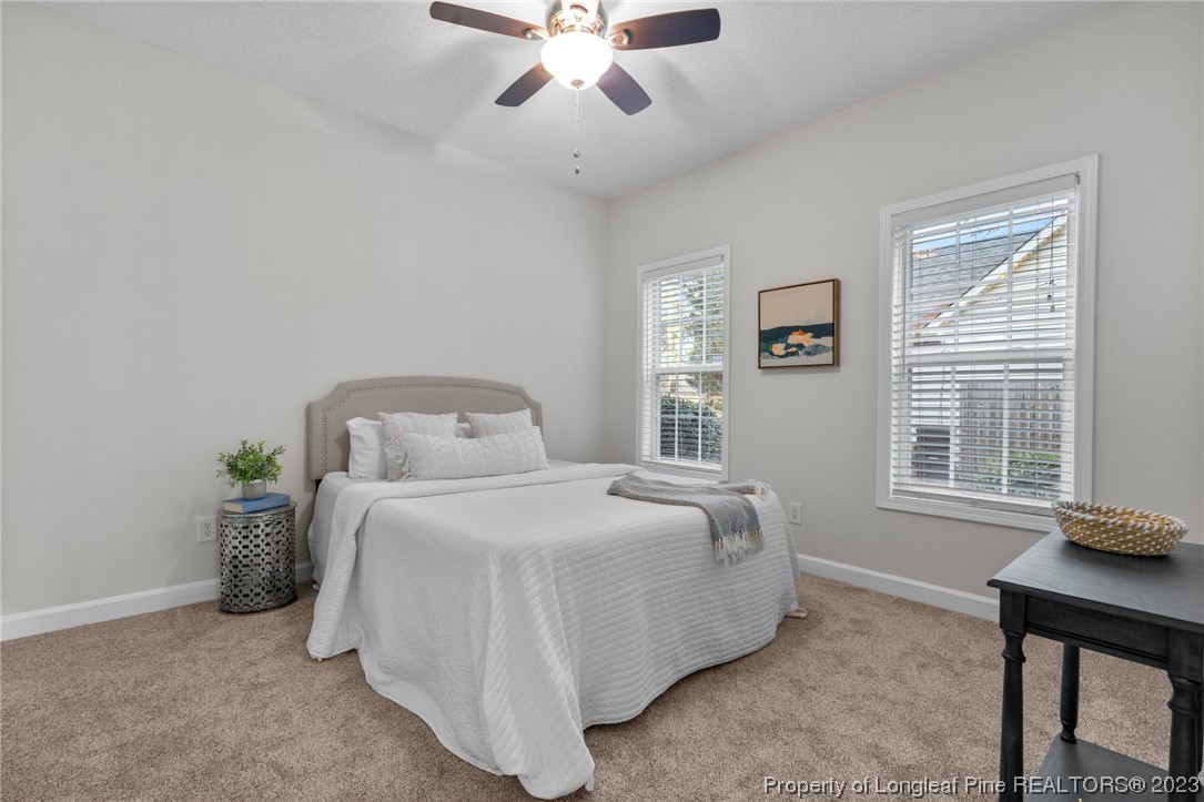 45 Sawmill Road West Pinehurst, NC 28374 - Photo 23 of 36 a bedroom with a bed and a window
