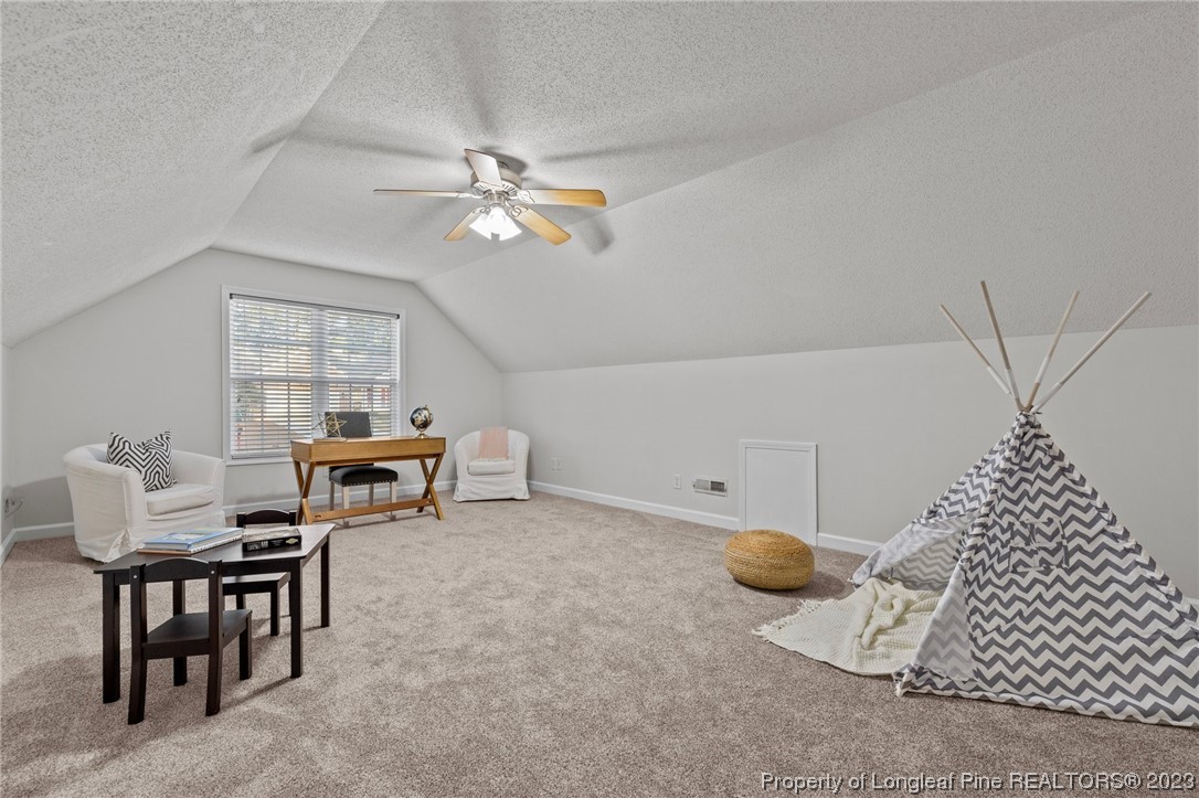 45 Sawmill Road West Pinehurst, NC 28374 - Photo 29 of 36 a view of a livingroom with furniture and chandelier