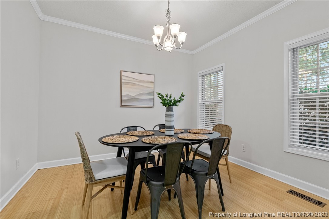 45 Sawmill Road West Pinehurst, NC 28374 - Photo 8 of 36 a view of a dining room with furniture and window
