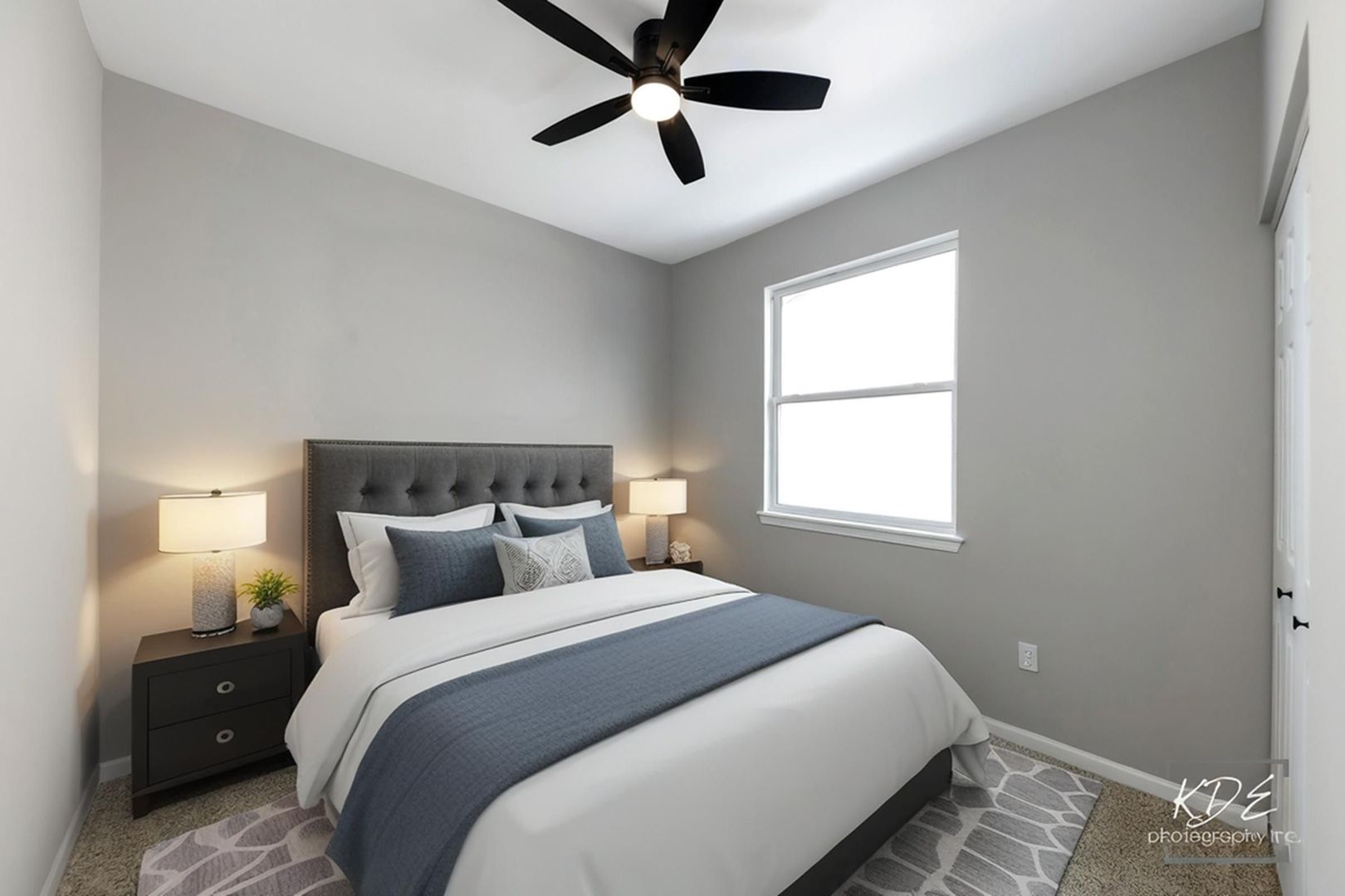 733 Mecosta Lane Romeoville, IL 60446 - Photo 20 of 36 a bedroom with a large bed and a window