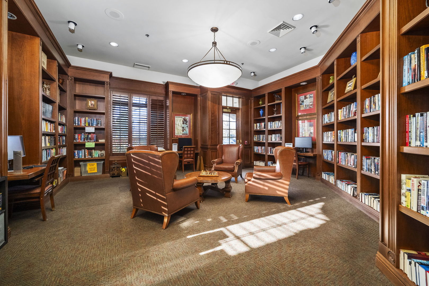 733 Mecosta Lane Romeoville, IL 60446 - Photo 31 of 36 a living room with furniture and a chandelier