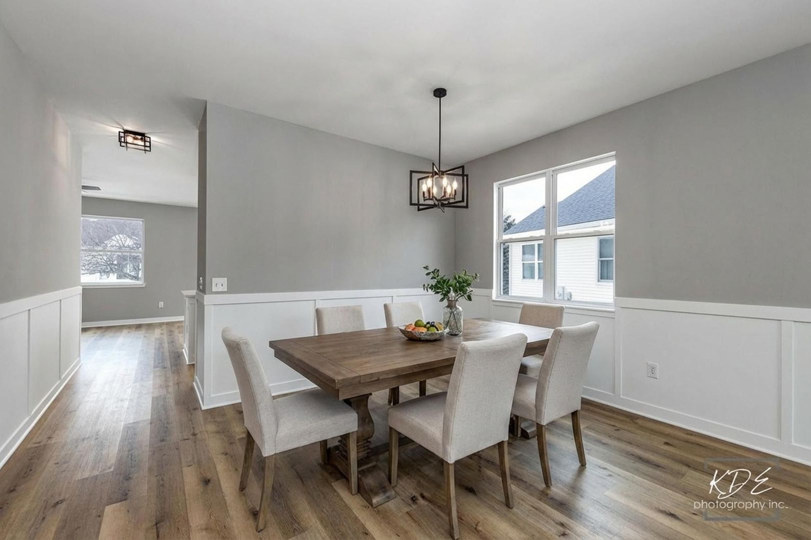 733 Mecosta Lane Romeoville, IL 60446 - Photo 6 of 36 a view of a dining room with furniture window and wooden floor