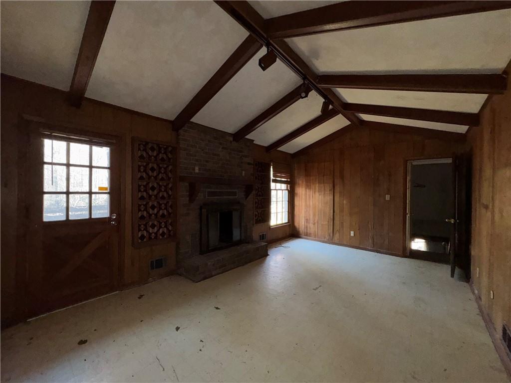 3955 Demooney Road Atlanta, GA 30349 - Photo 17 of 26 a view of empty room with a fireplace