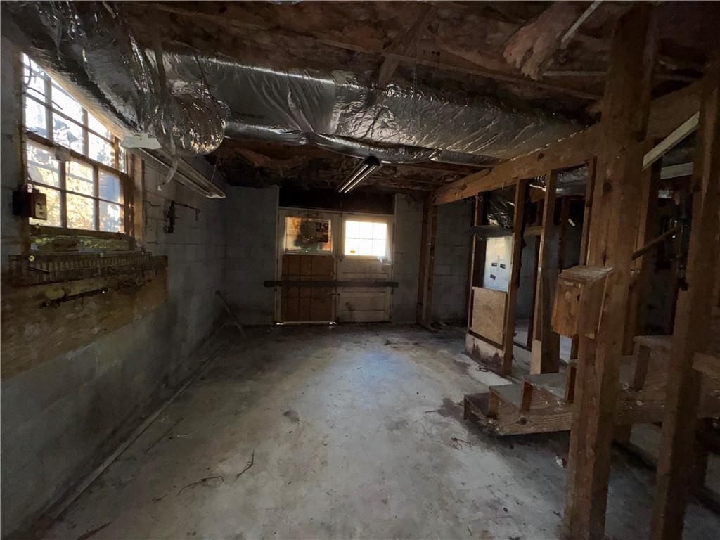 3955 Demooney Road Atlanta, GA 30349 - Photo 21 of 26 a view of an empty room with a fireplace