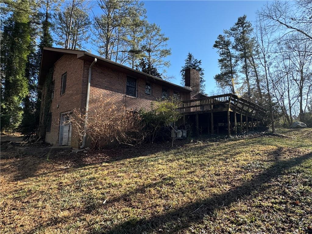 3955 Demooney Road Atlanta, GA 30349 - Photo 5 of 26 a view of a house with a yard