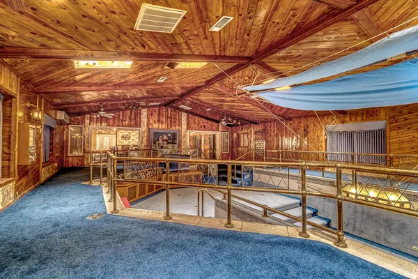 a view of a room with racks on the wall