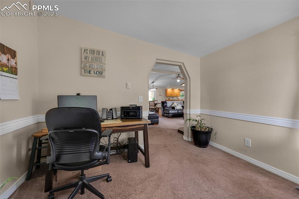 28230 Washington Road Calhan, CO 80808 - Photo 21 of 40 a work room with furniture and gym equipment