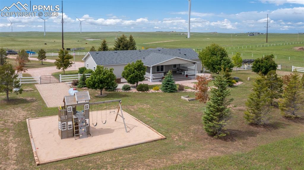 28230 Washington Road Calhan, CO 80808 - Photo 24 of 40 a view of a house with a yard