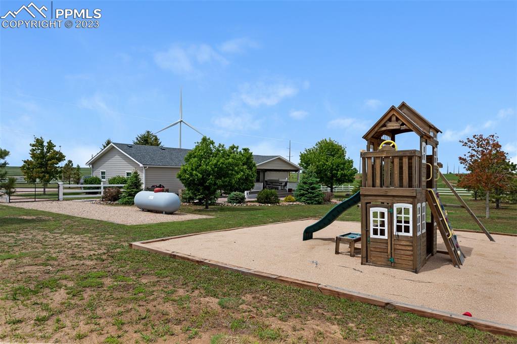 28230 Washington Road Calhan, CO 80808 - Photo 25 of 40 a view of a house with backyard porch and sitting area