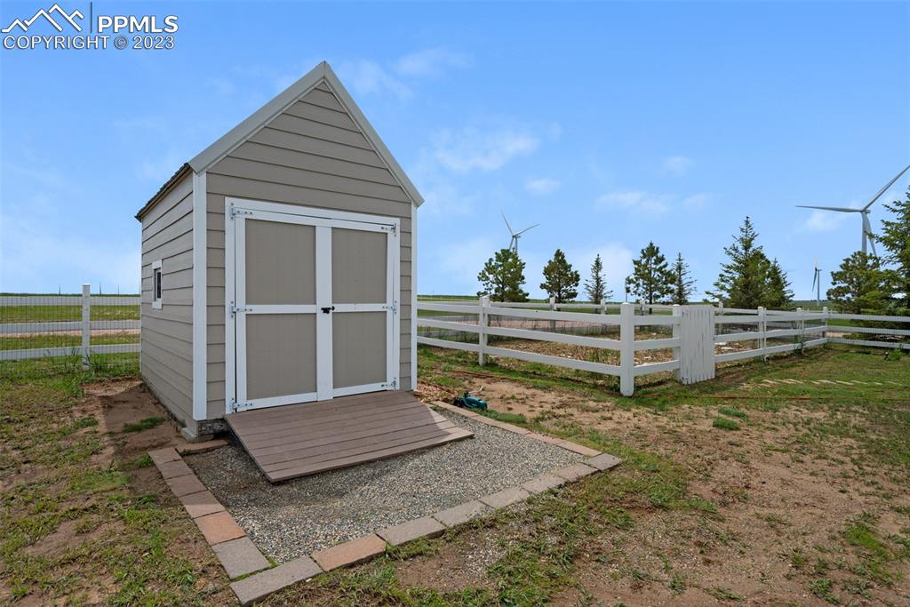 28230 Washington Road Calhan, CO 80808 - Photo 27 of 40 a view of backyard with wooden fence