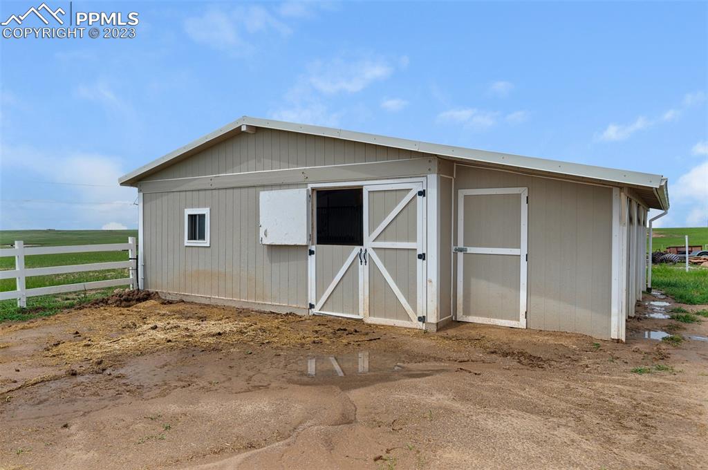 28230 Washington Road Calhan, CO 80808 - Photo 31 of 40 a view of backyard of house