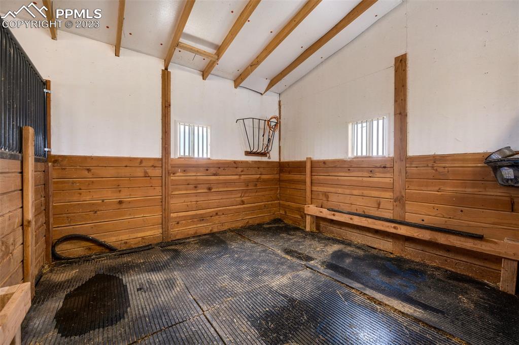28230 Washington Road Calhan, CO 80808 - Photo 33 of 40 a view of a room with rack on the wall