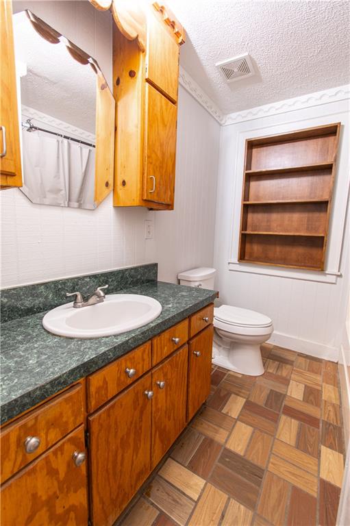 250 Nottingham Way Fairmount, GA 30139 - Photo 23 of 43 a bathroom with a granite countertop sink and a mirror