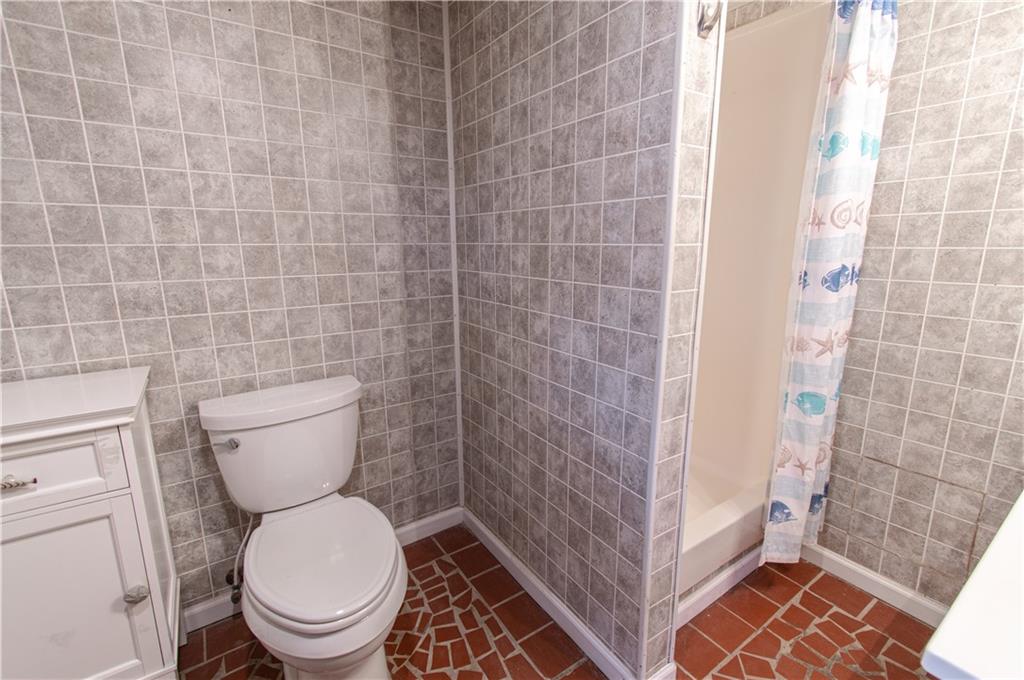 250 Nottingham Way Fairmount, GA 30139 - Photo 29 of 43 a bathroom with a toilet and a shower