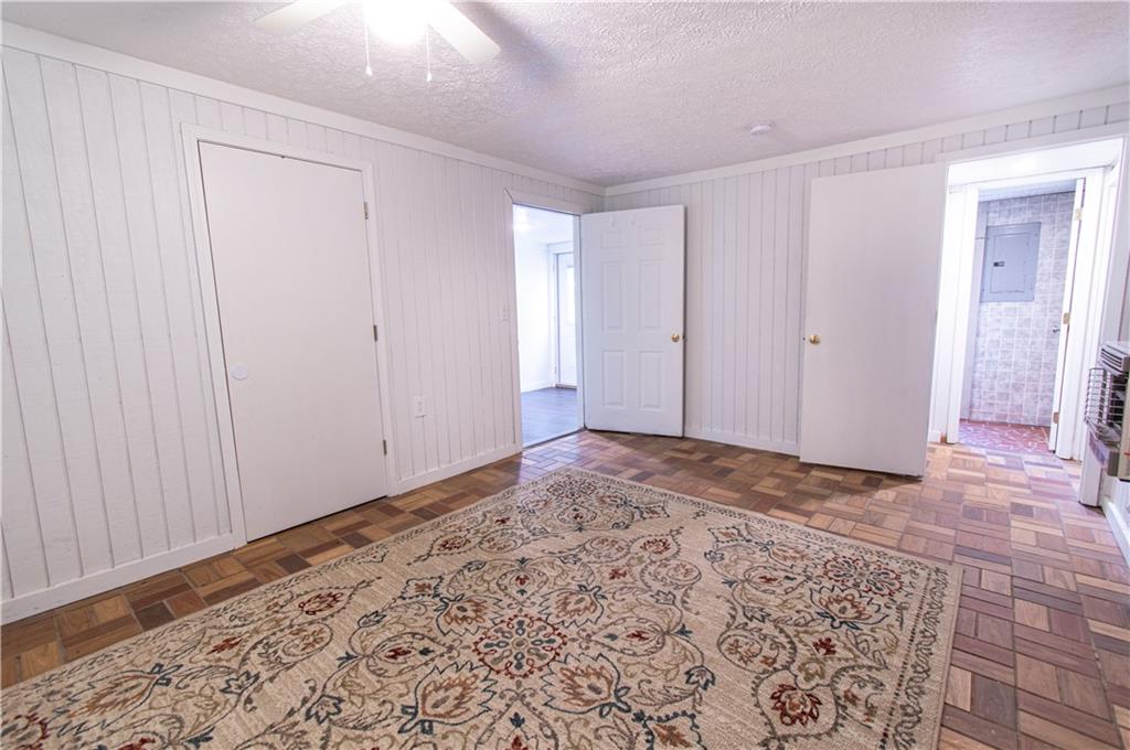 250 Nottingham Way Fairmount, GA 30139 - Photo 37 of 43 a view of a big room with window and wooden floor