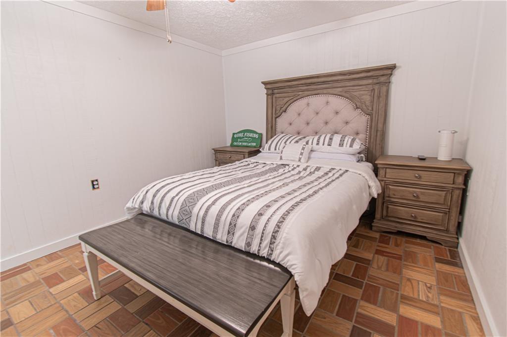 250 Nottingham Way Fairmount, GA 30139 - Photo 39 of 43 a bedroom with a bed and a window