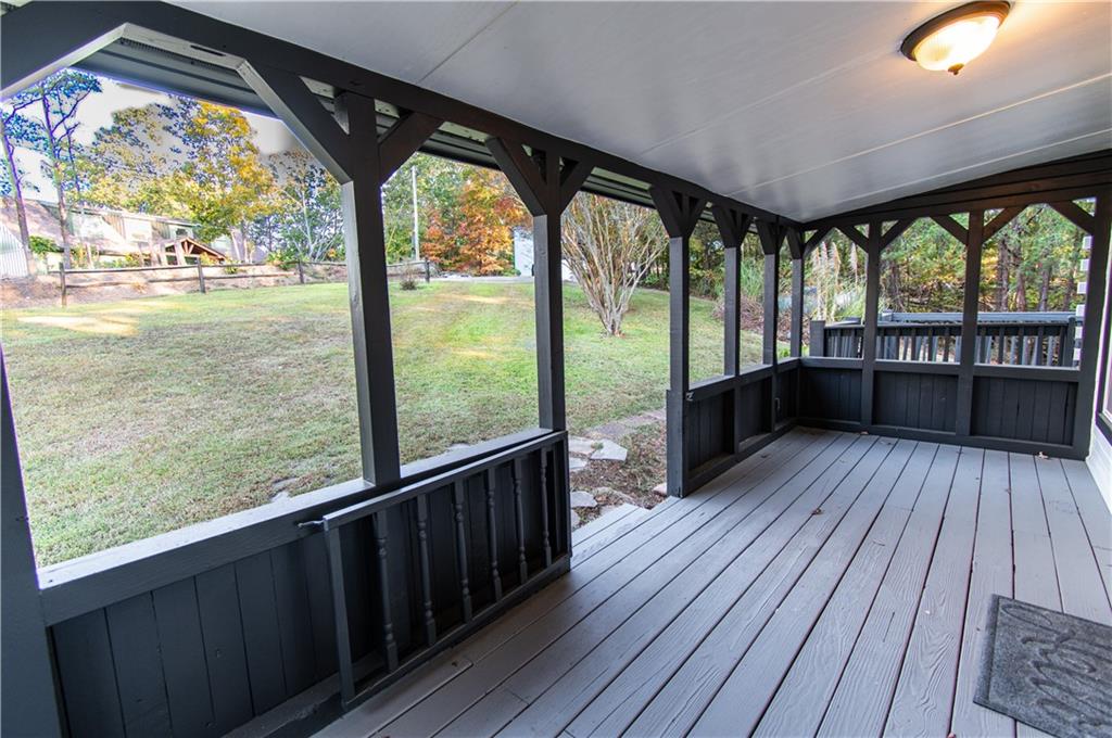 250 Nottingham Way Fairmount, GA 30139 - Photo 8 of 43 a view of a room with wooden floor and deck
