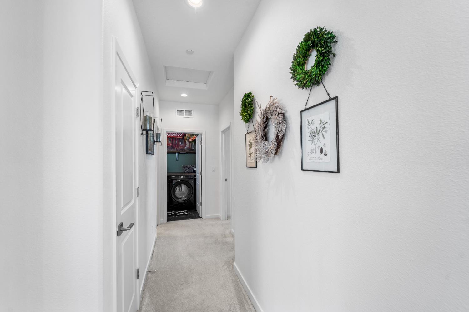 4301 San Miguel Road Madera, CA 93636 - Photo 31 of 60 a view of a hallway with closet and a potted plant