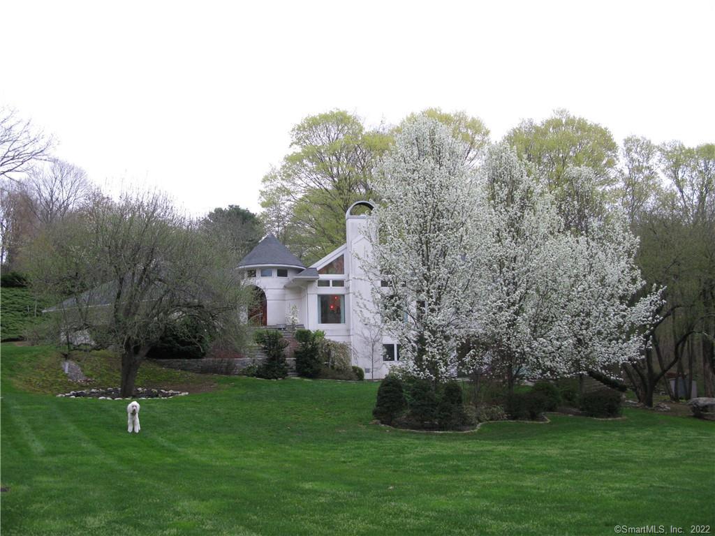 220 Meeting House Road Hebron, CT 06248 - Photo 1 of 1 Lush grounds embrace this Fairytale Home. Welcome Home to Country Villa in Hebron Connecticut.