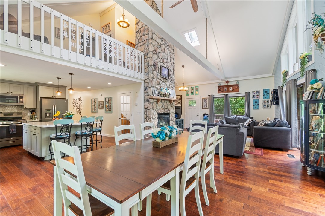 7733 East Port Bay Road Wolcott, NY 14590 - Photo 20 of 49 Imagine entertaining in this space! Equally comfortable and functional!