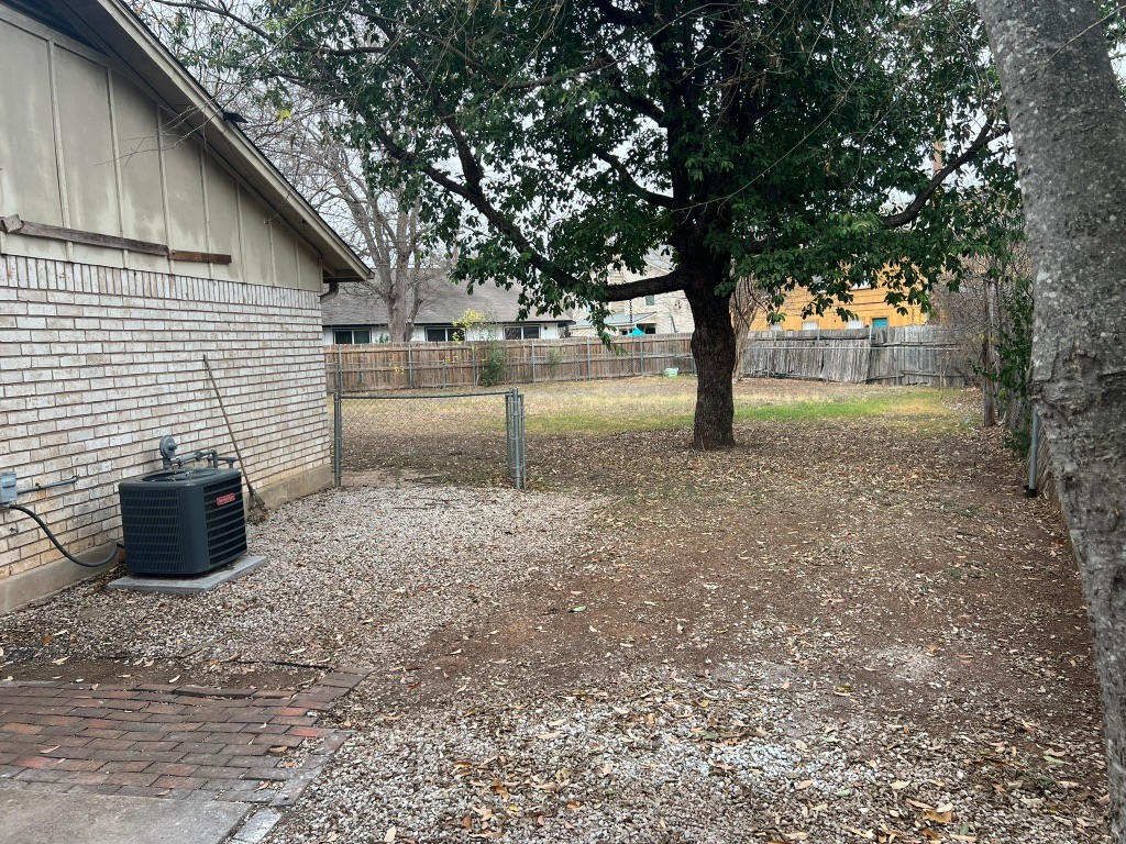 5302 Indio Circle, Unit A Austin, TX 78745 - Photo 12 of 13 View of fenced backyard