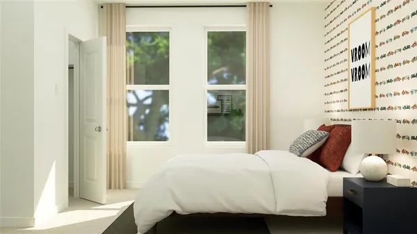 a bedroom with a bed and window